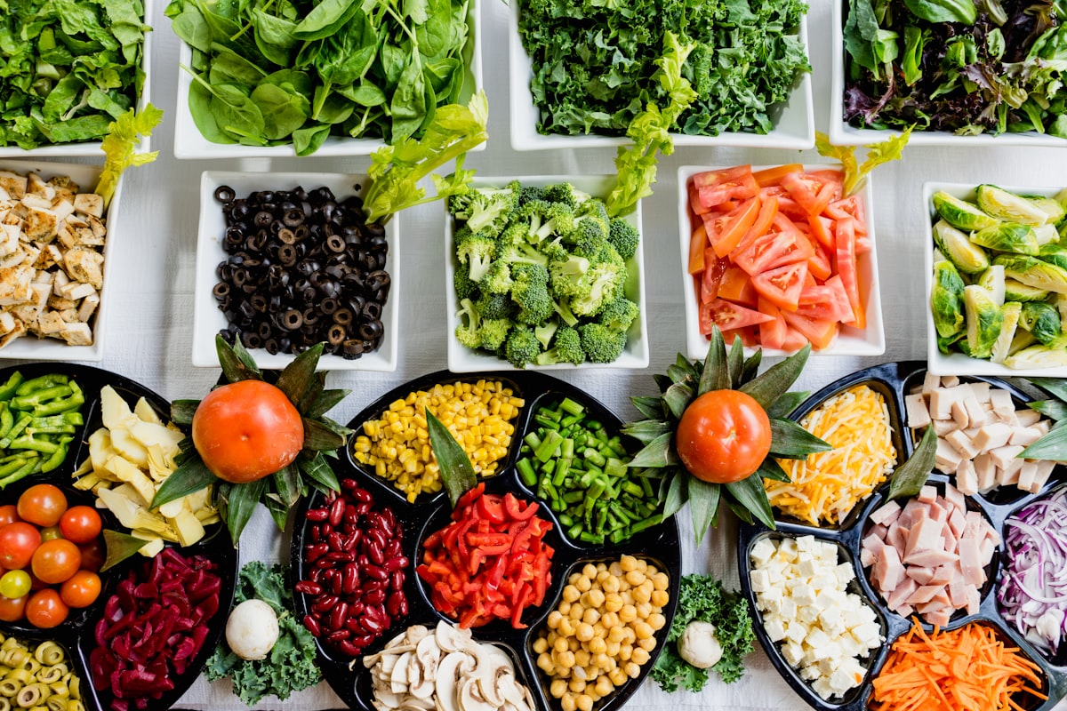 Meal prep containers filled with colorful healthy food