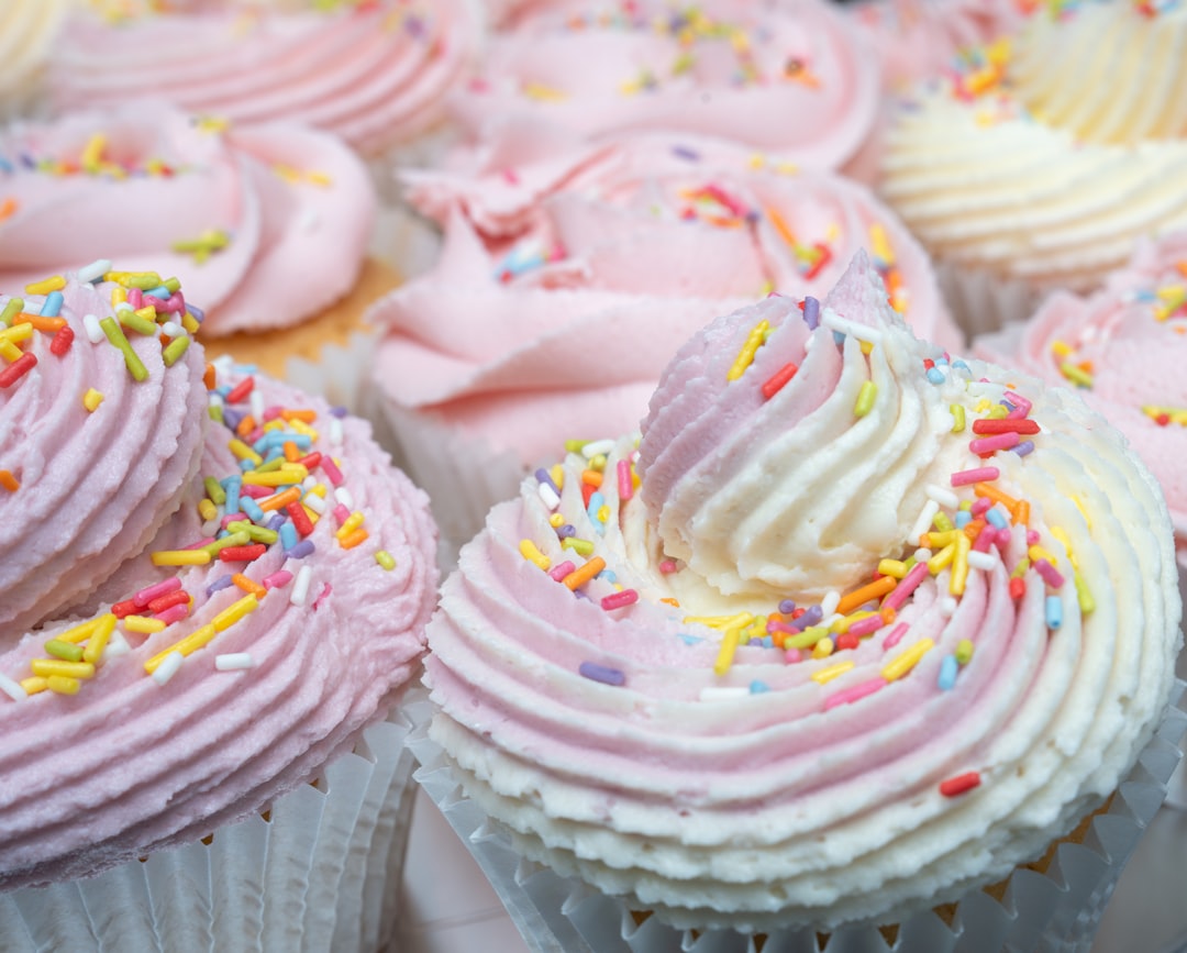 Cupcakes with pastel frosting and colorful sprinkles