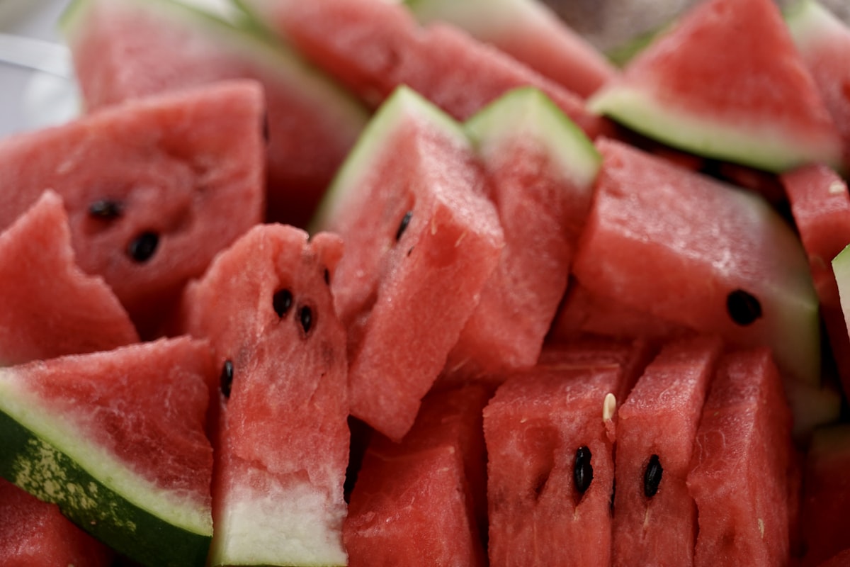 Viral watermelon shaved ice in a bowl, pink and fluffy, topped with fresh mint